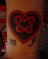 celtic heart hand tattoos